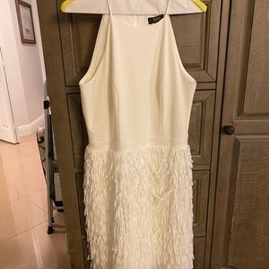 White dress with fun frills - perfect for the bride to be!